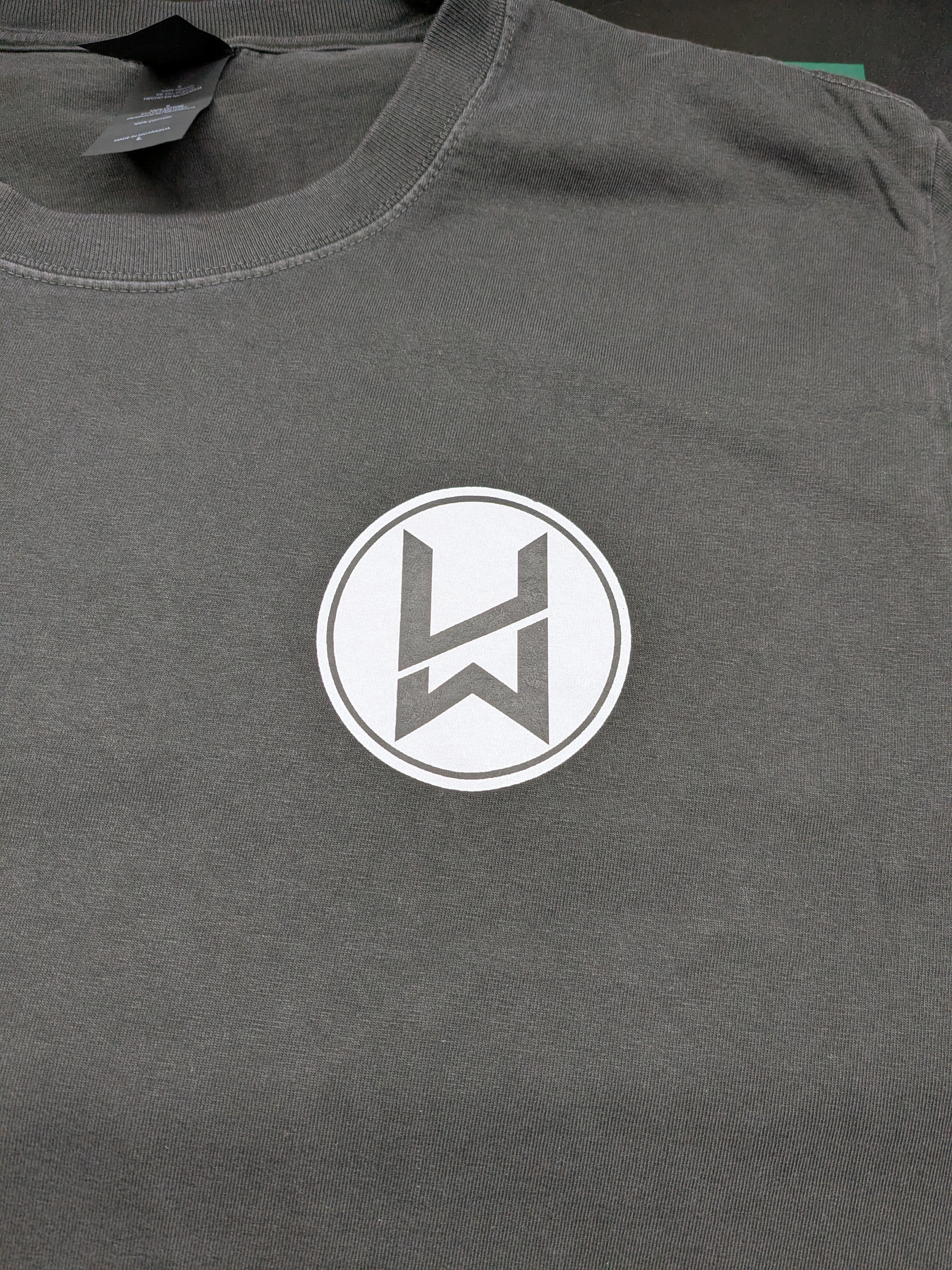 White circular Hourworn chest mark on the gray Street Icons test shirt